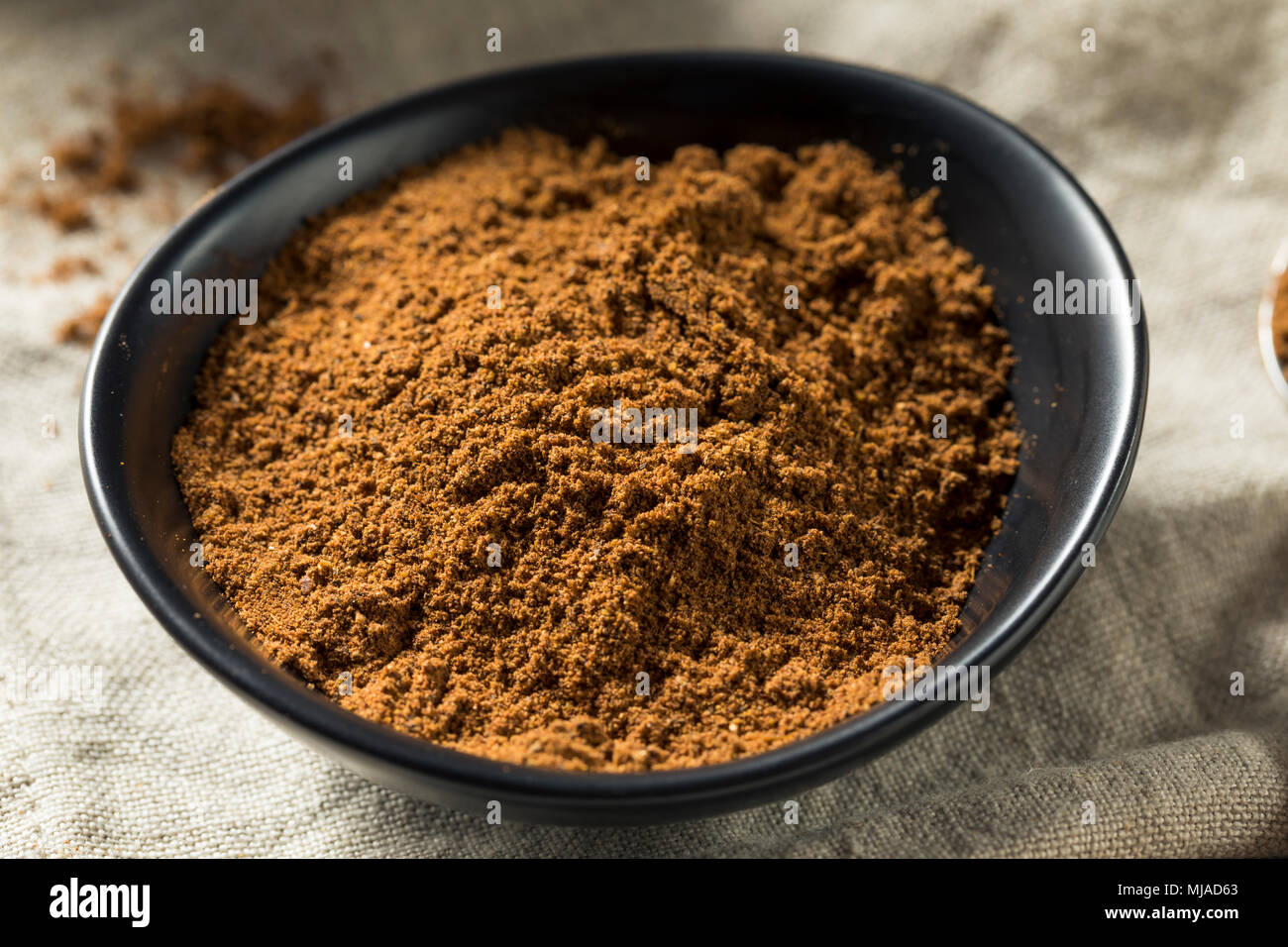 Organici di Garam Masala Indian Spice in una ciotola Foto Stock
