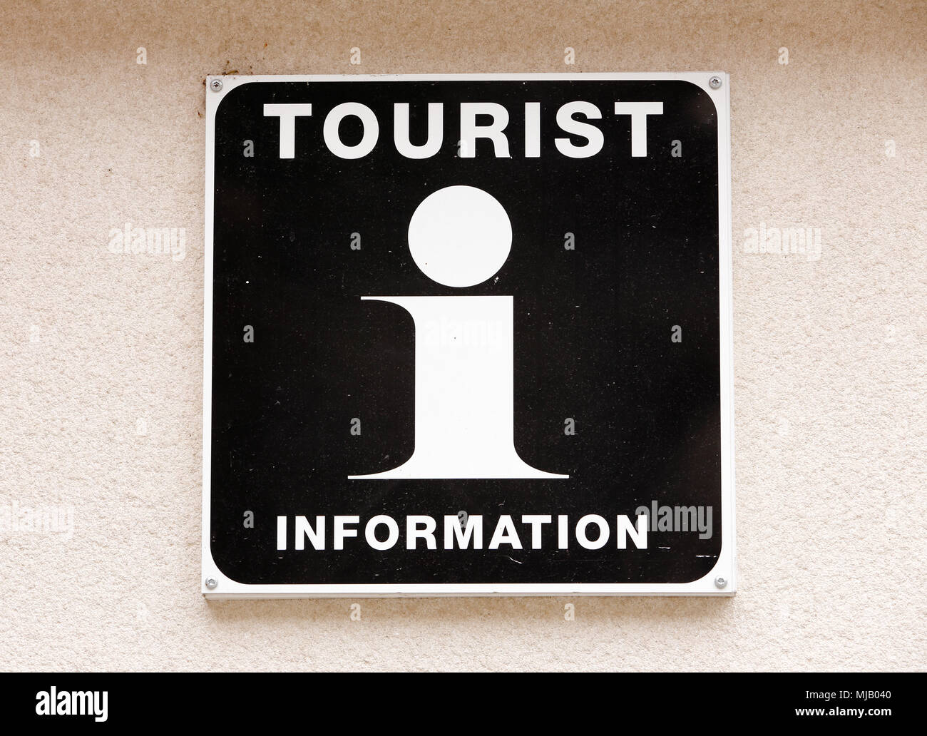 Informazioni turistiche firmare con la lettera che ho montato su una parete. Foto Stock