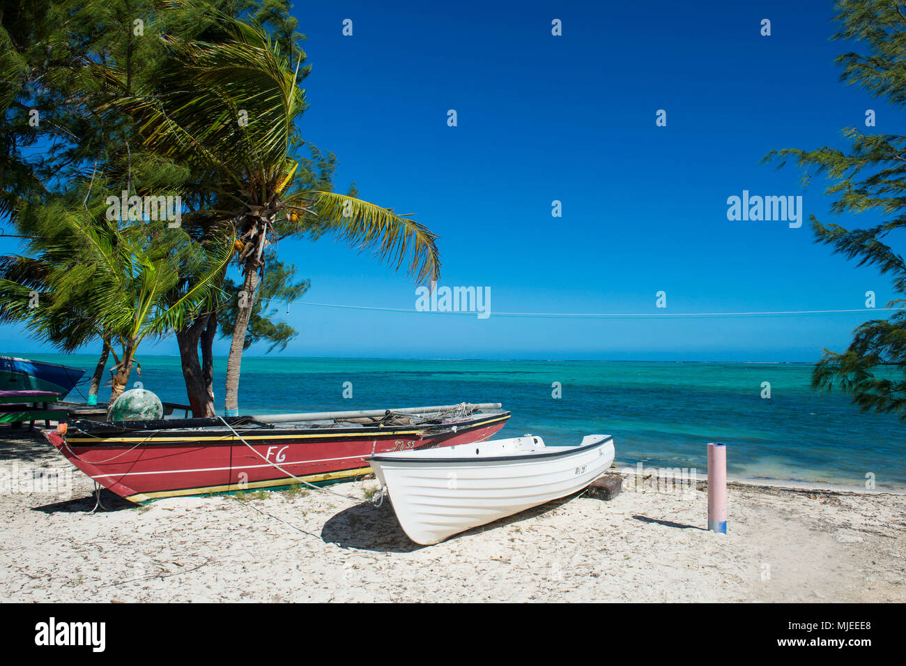 Poco barche da pesca Providenciales, Turks e Caicos Foto Stock