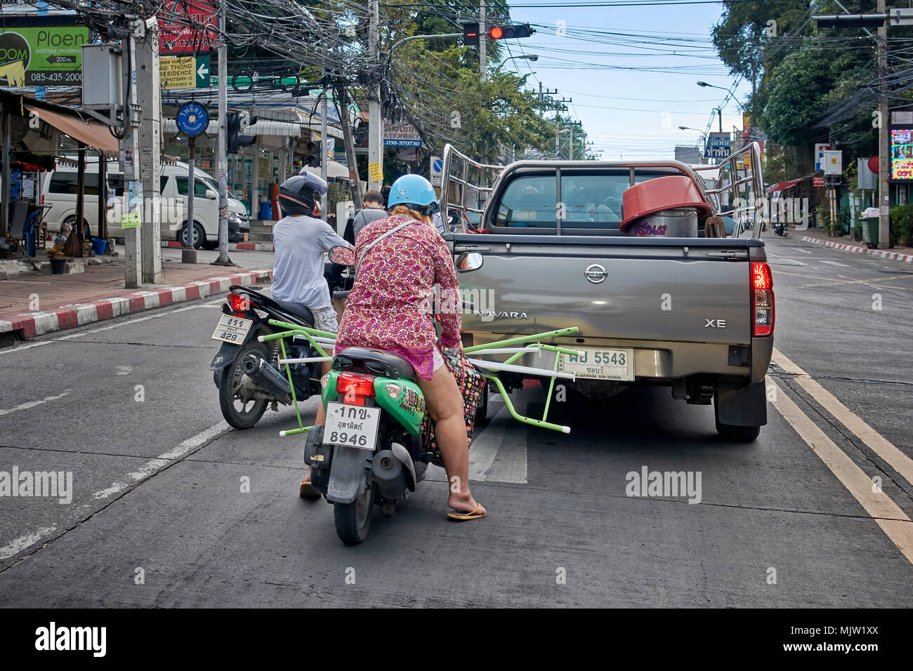 Thailandia moto. Carico pericoloso e pericoloso su una motocicletta tailandese. Thailandia Sud-Est asiatico Foto Stock