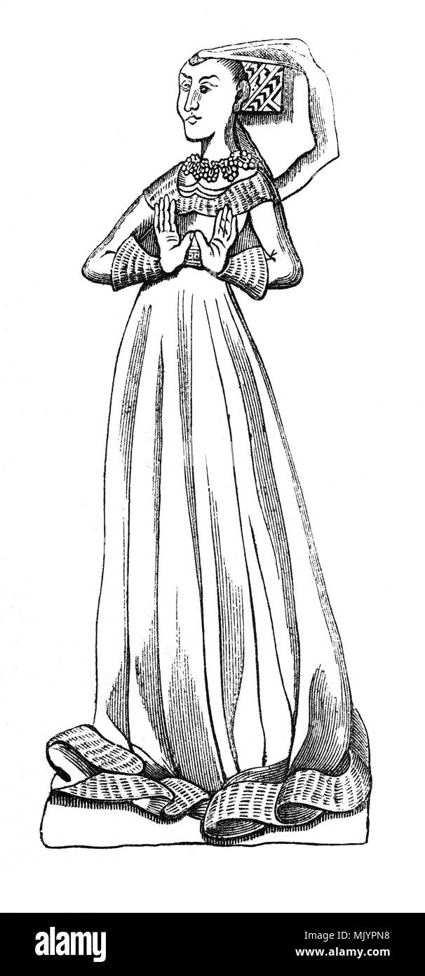 L effige della Madonna Peyton, moglie di Sir Thomas Peyton (1418-1484) di Isleham, Cambridgeshire, Inghilterra che è stato due volte Sheriff di Cambridgeshire e Huntingdonshire, nel 1443 e 1453. Egli ha ricostruito la chiesa di Sant'Andrea in Isleham, nel coro di cui sopravvive la famiglia monumentale in ottone. Foto Stock
