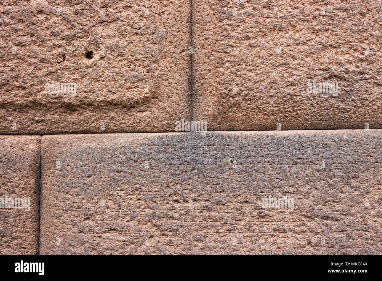 Close-up di dettaglio Inca parete a bugnato in pietra preciso blocco giunzione, Cusco, Perù Foto Stock