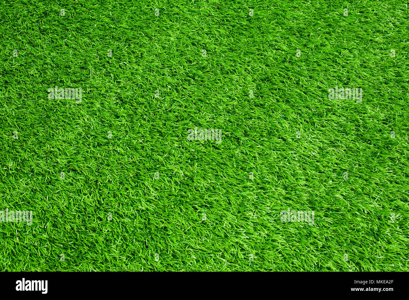 Verde erba artificiale da sola massa di calcio Foto Stock