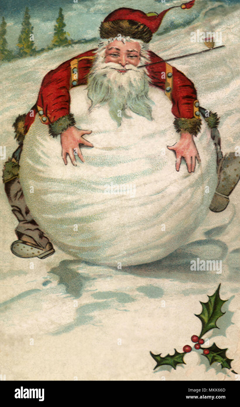 Santa sulla grande palla di neve Foto Stock