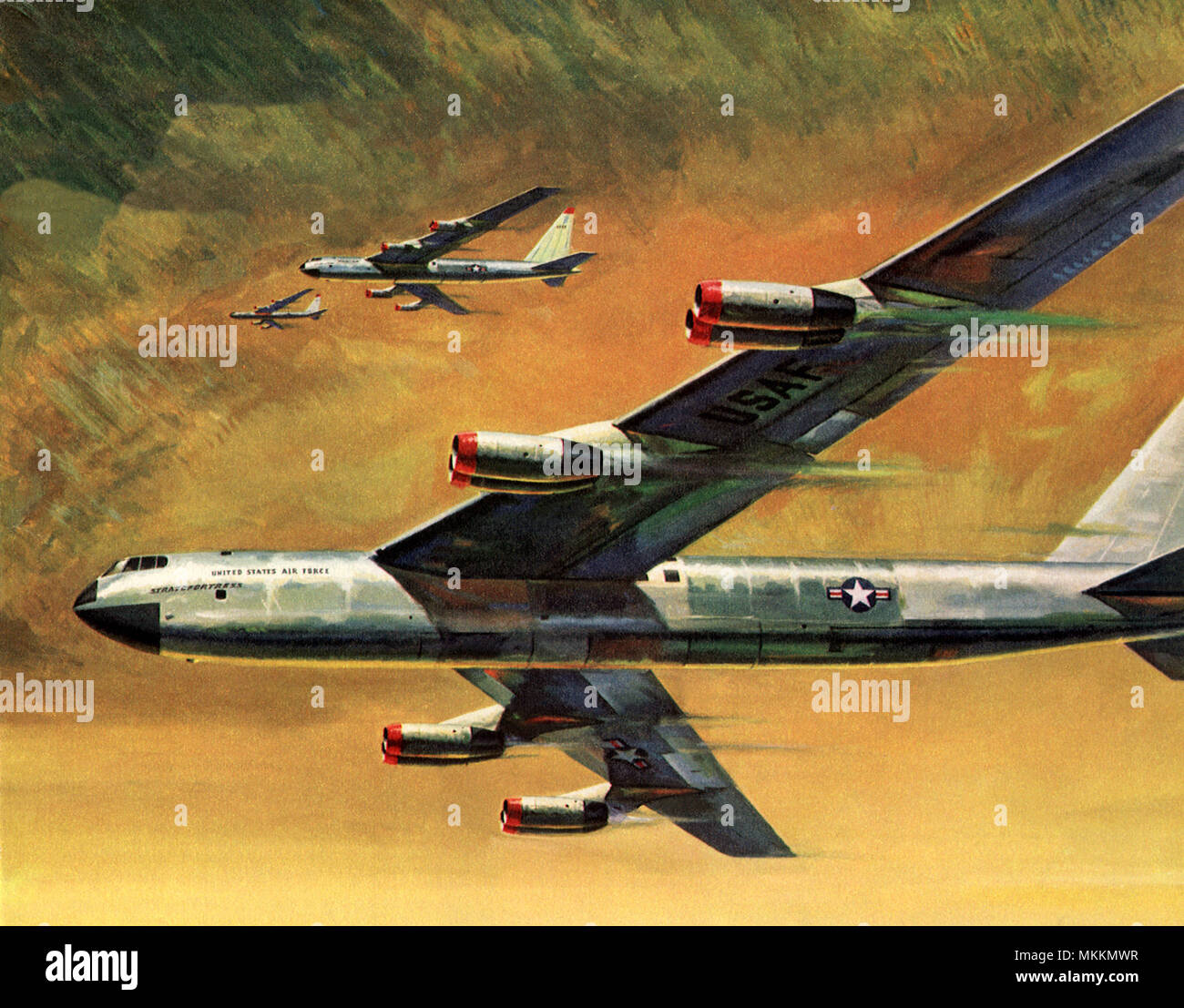 Dei bombardieri B-52 volare attraverso i cieli di colore giallo Foto Stock
