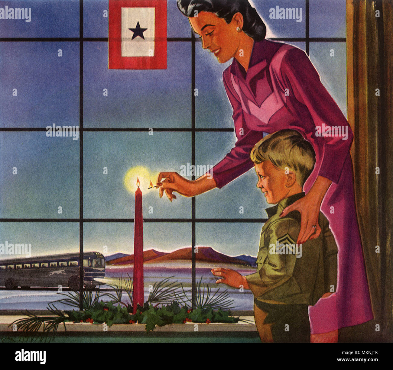 Madre con bambino candela di illuminazione per lo sforzo di guerra Foto Stock