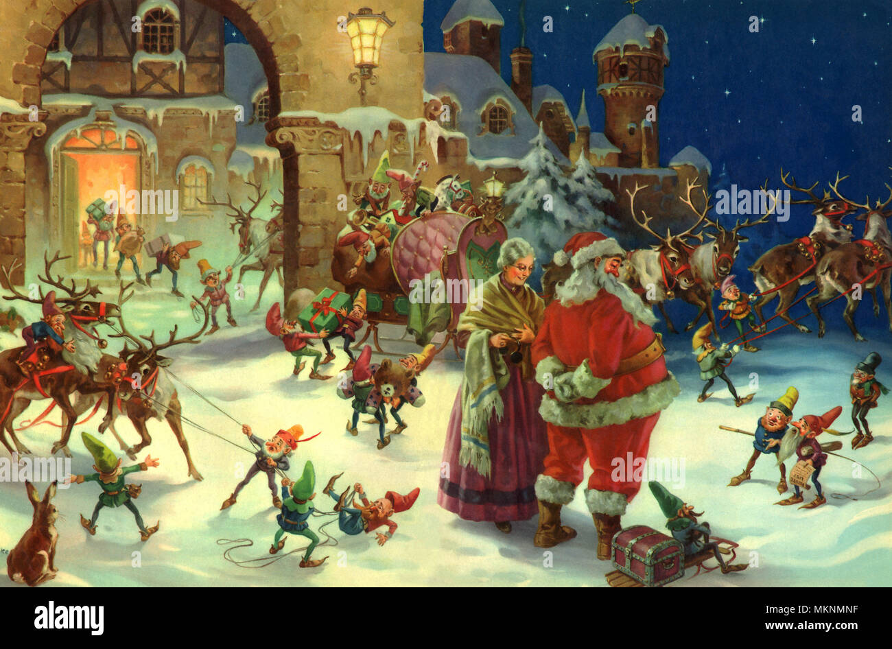 Santa, il suo onorevole e gli elfi Foto Stock