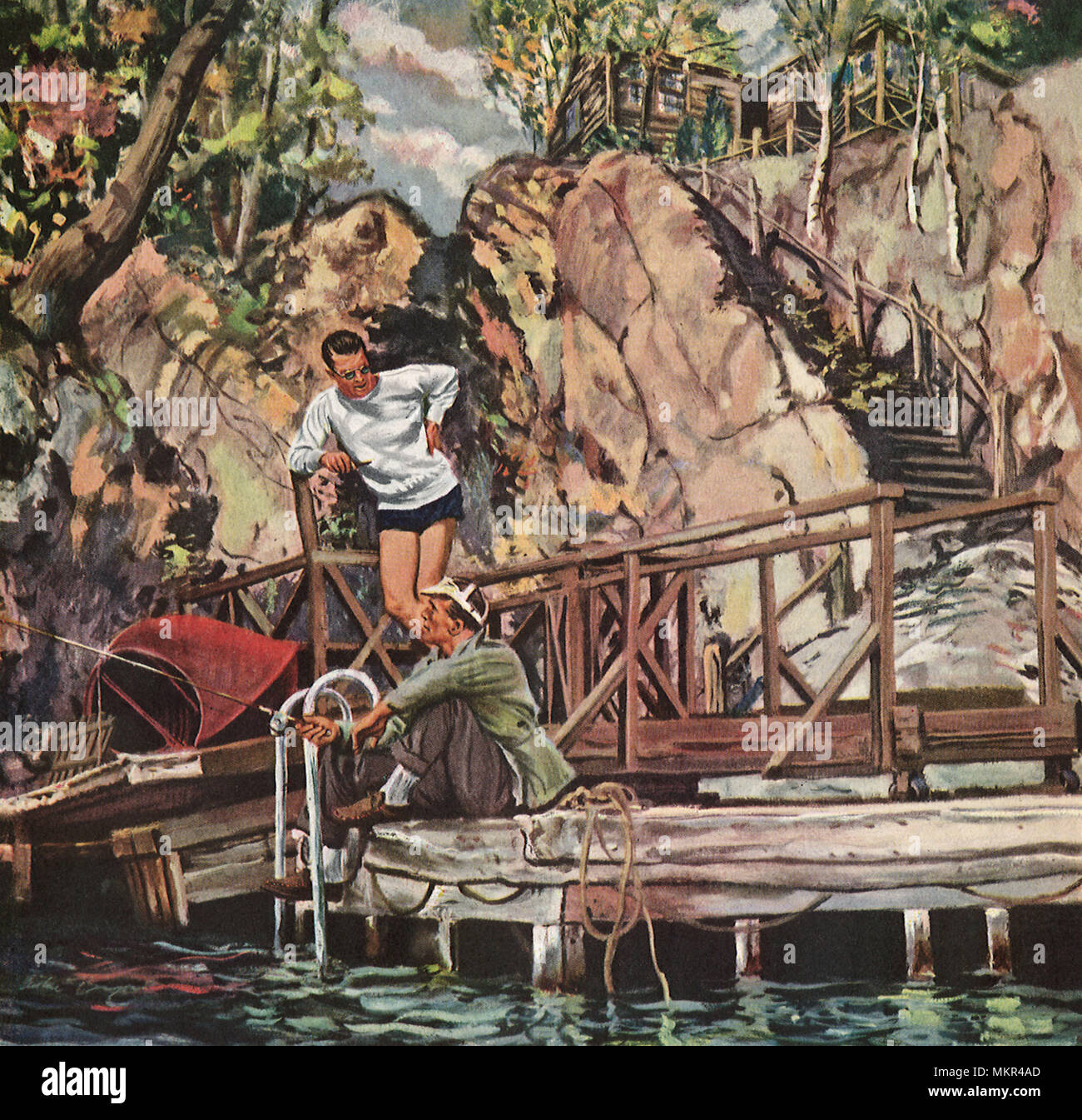 Gli uomini chat durante le operazioni di pesca Foto Stock