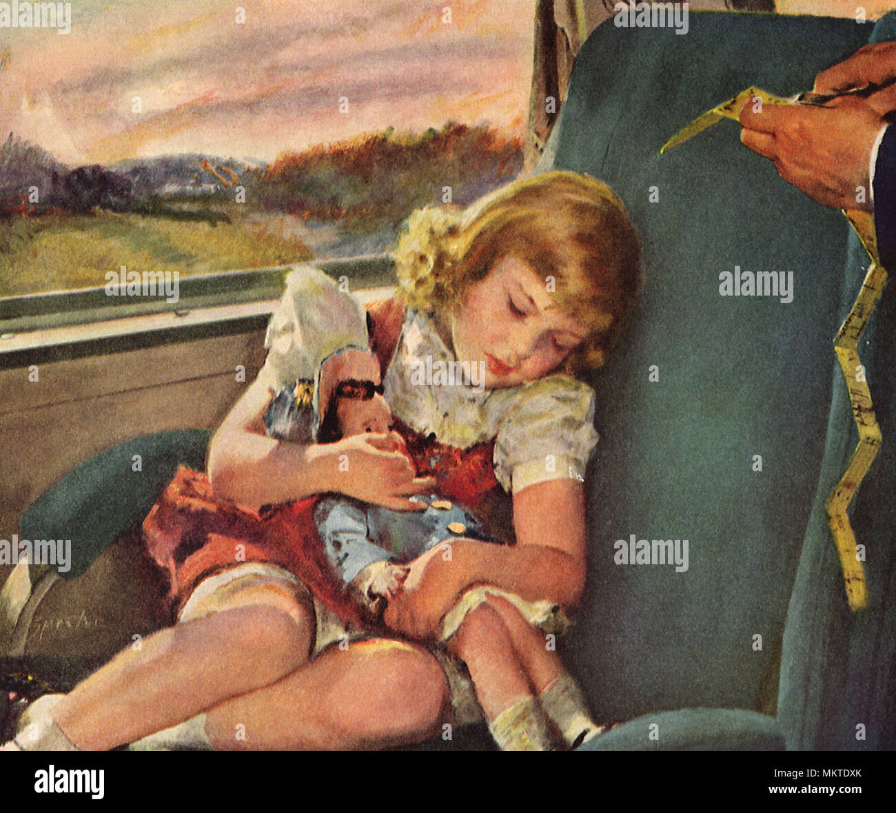 Ragazza dorme con bambola sul treno Foto Stock