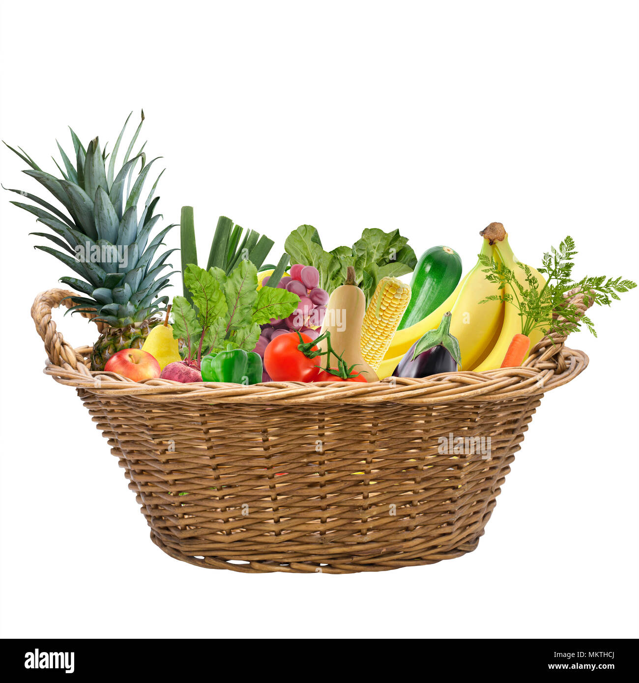 La frutta e la verdura fresca in un cestello isolato su sfondo bianco Foto Stock