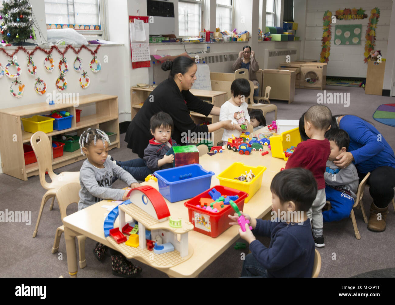 Lower East Side multi etnico scuola materna nel quartiere di Chinatown di Manhattan. Foto Stock