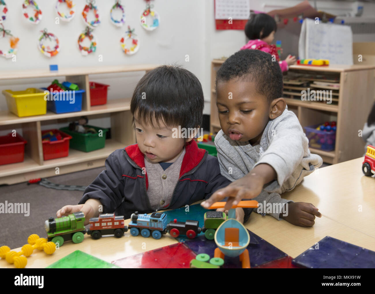 Lower East Side multi etnico scuola materna nel quartiere di Chinatown di Manhattan. Foto Stock