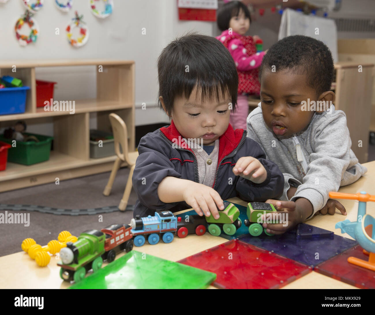 Lower East Side multi etnico scuola materna nel quartiere di Chinatown di Manhattan. Foto Stock