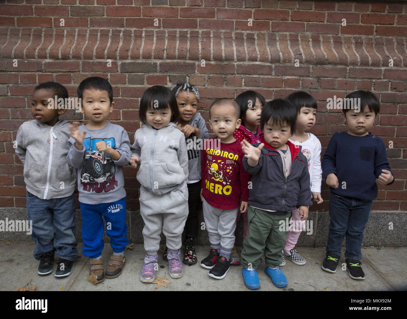 Lower East Side multi etnico scuola materna nel quartiere di Chinatown di Manhattan. Foto Stock