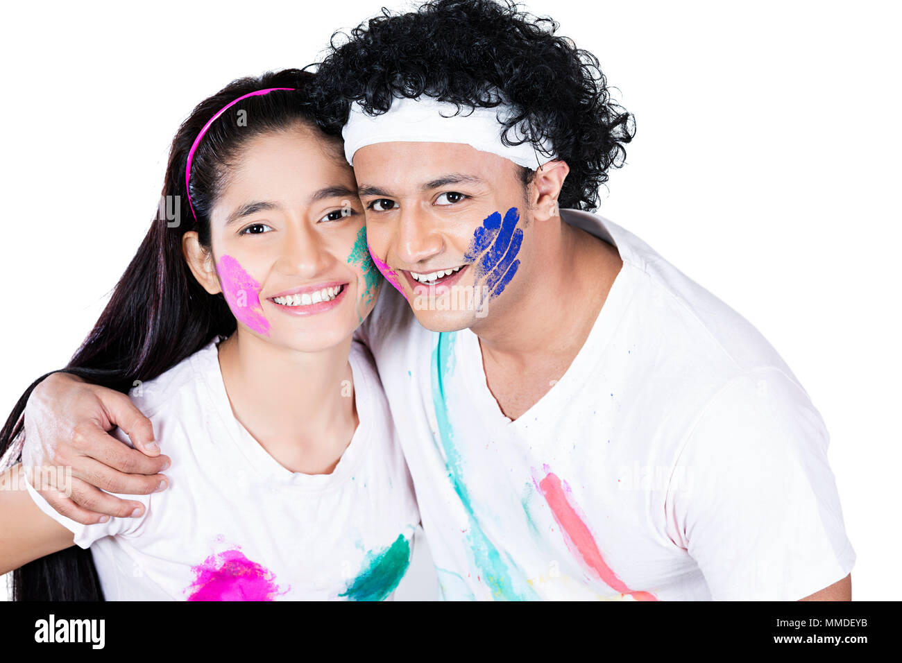 Due Teenager e amico di ragazza Holi festival godere insieme Foto Stock