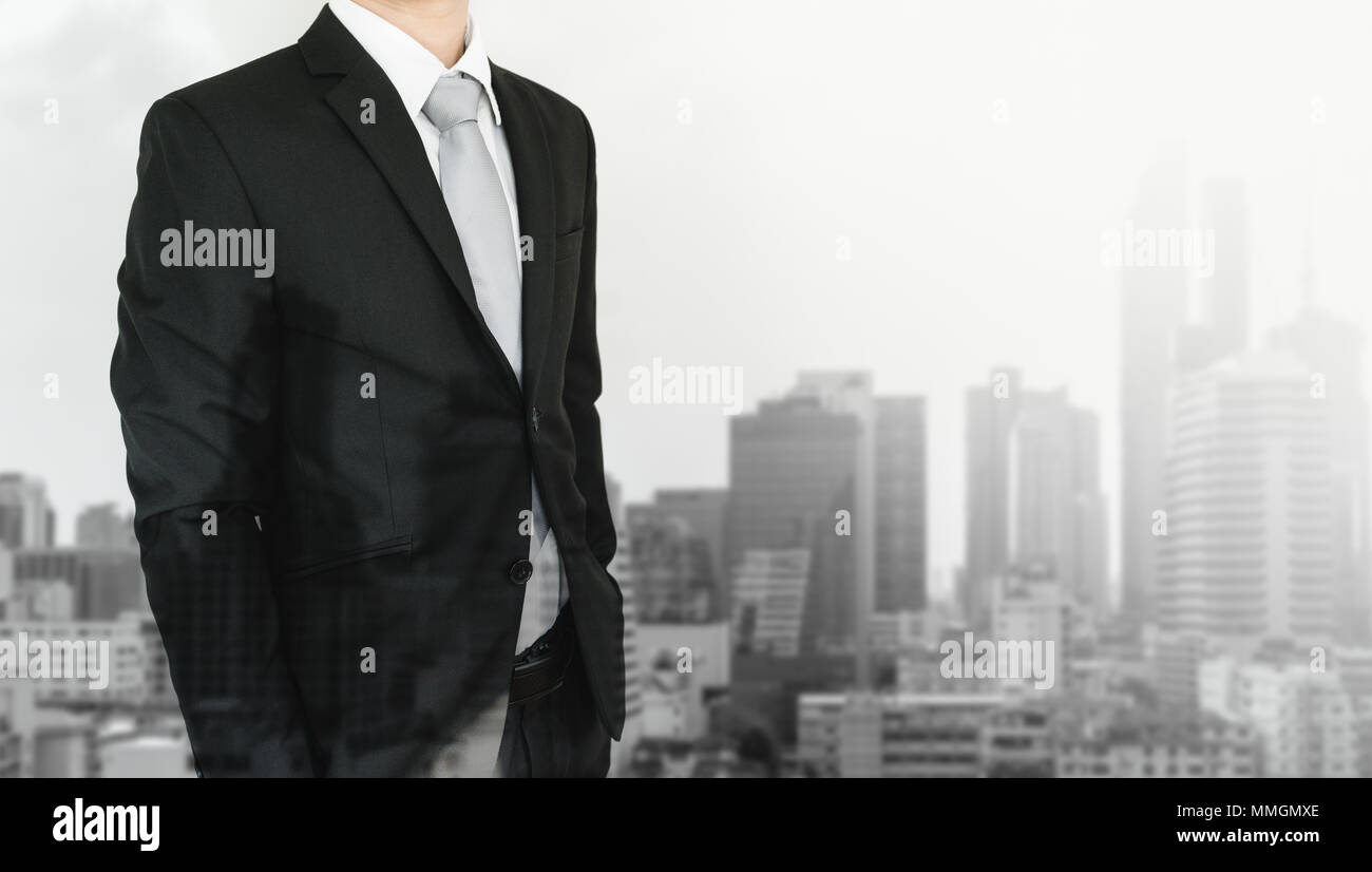 La doppia esposizione, imprenditore e sullo sfondo della città Foto Stock