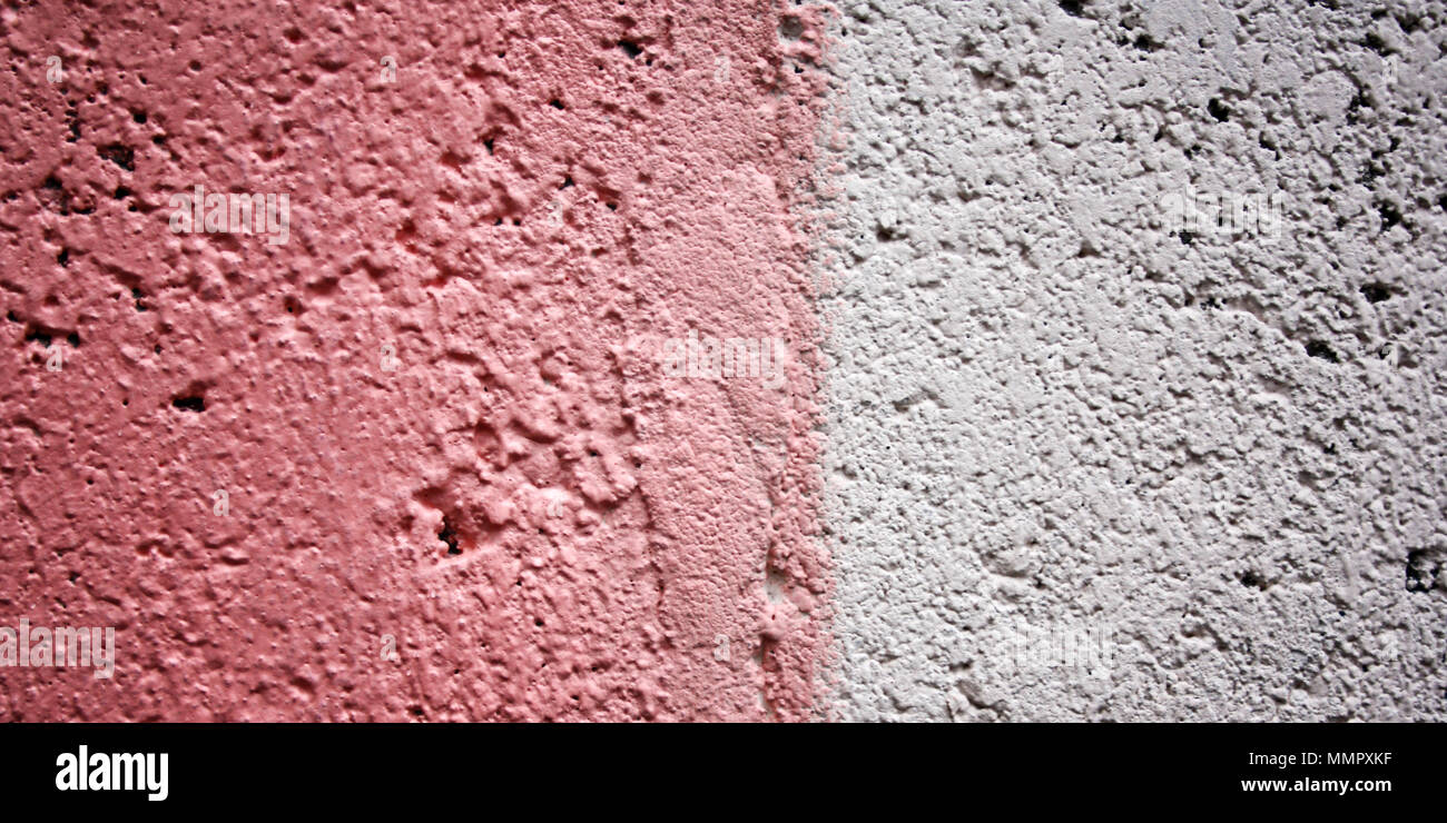 Il vecchio muro rosa sfondo. Copia spazio per il testo. Foto di età. Parete di colore sfondo macro. City building texture. Effetto tonico. parete dipinta da vicino. Ri Foto Stock