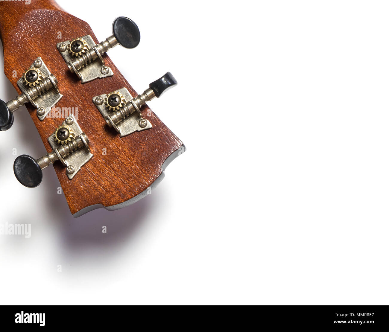 Testa di chitarra manopola Tuning girare su sfondo bianco Foto Stock