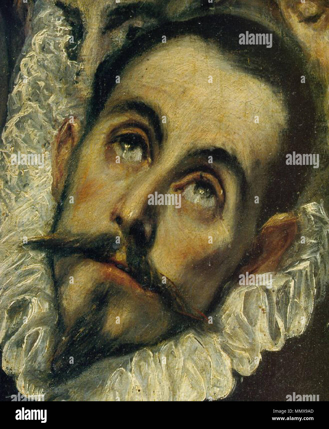 . Español: El entierro del Señor de Orgaz, más conocido como el entierro del Conde de Orgaz, es onu óleo sobre lienzo pintado en estilo manierista por el Greco entre los años 1586 y 1588. Fue realizado para la Iglesia de Santo Tomé de Toledo, (España), donde aun permanece, y es considerada una de las las mejores obras de su autor. El cuadro rappresentanouna el milagro en el que, según la tradición, San Esteban y San Agustín de hipónimos bajaron del Cielo para enterrar personalmente a Gonzalo Ruiz de Toledo, señor de la Villa de Orgaz y fallecido en 1323, en la Iglesia de Santo Tomé, como premio por su Foto Stock