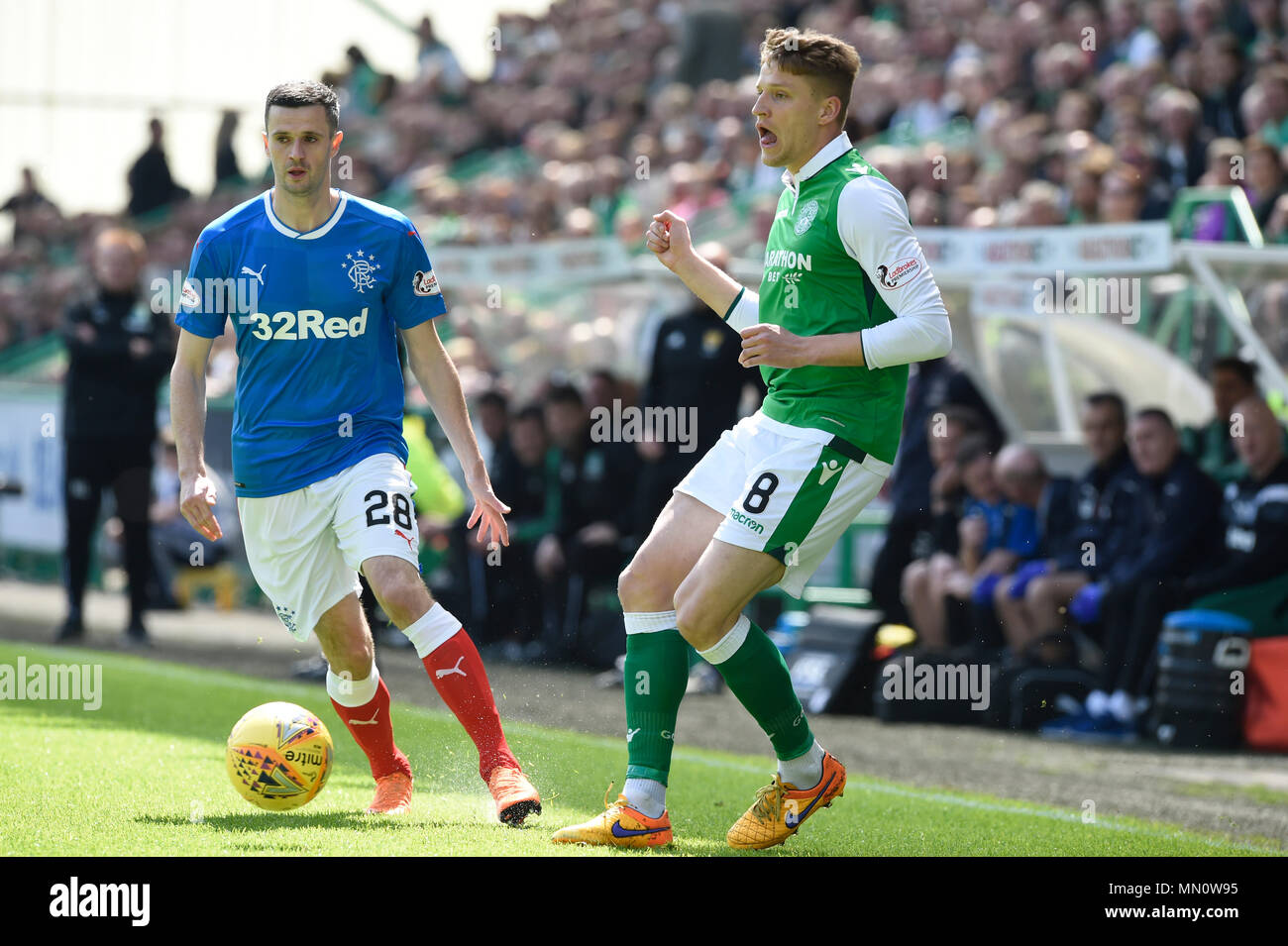 Rangers Jamie Murphy e Hibernian's Vykintas Slivka durante la Ladbrokes Premiership scozzese corrispondono a Pasqua Road, Edimburgo. Stampa foto di associazione. Picture Data: domenica 13 maggio, 2018. Vedere PA storia SOCCER Hibernian. Foto di credito dovrebbe leggere: Ian Rutherford filo PA. Restrizioni: solo uso editoriale Foto Stock