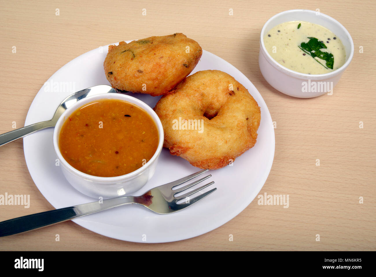 Sambhar wada un popolare sud indiane, noto anche come Medu ama. Foto Stock