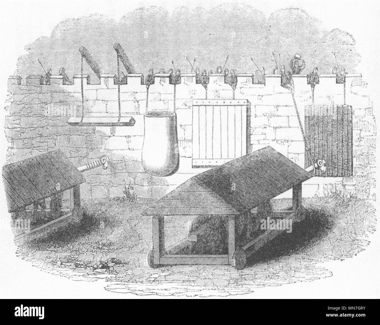 Assedi. Difendere i muri in pietra contro Battering-Ram 1845 antica stampa Foto Stock