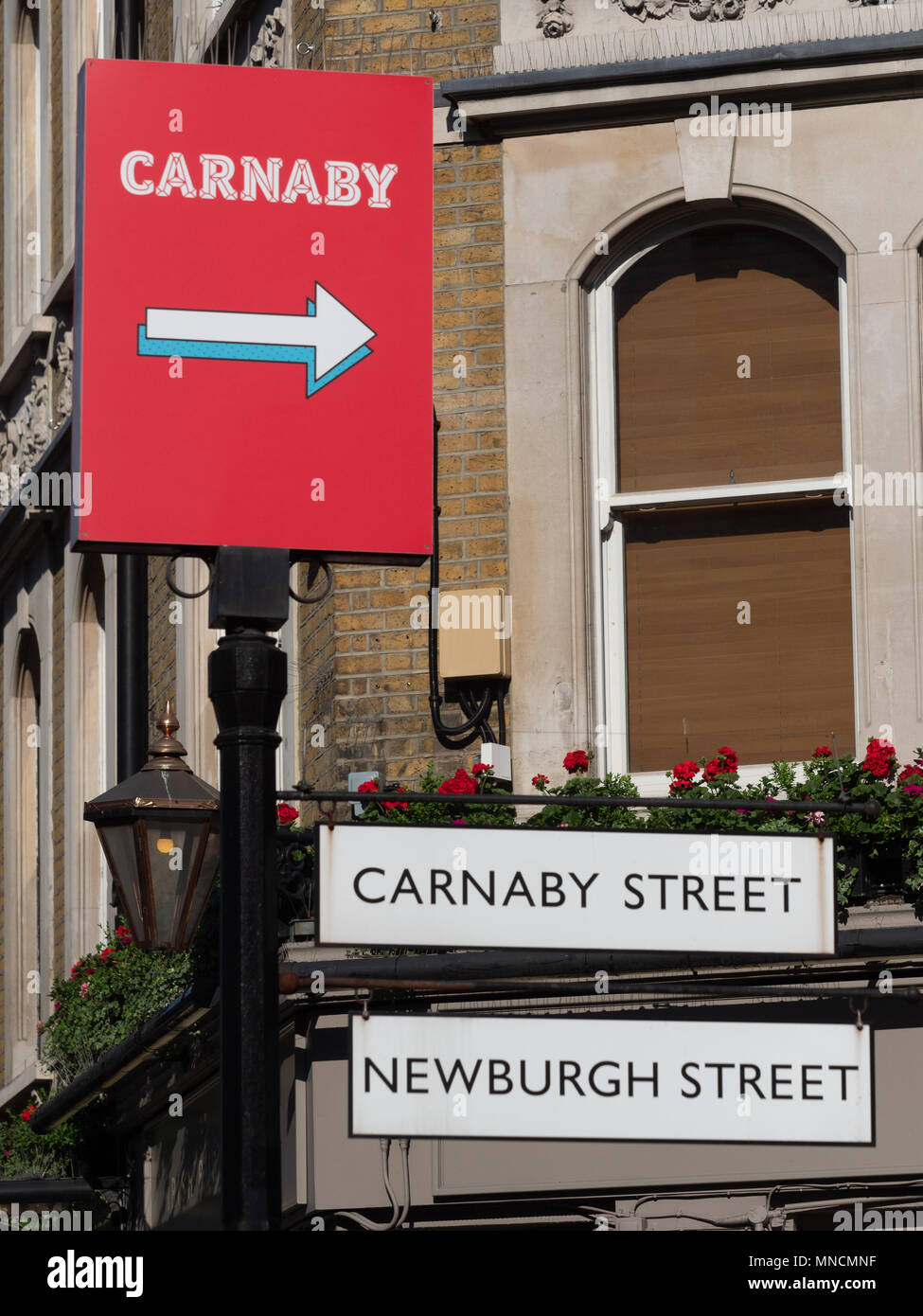 Soho Street segni - Carnaby Street e Newburgh Street nel West End di Londra Foto Stock