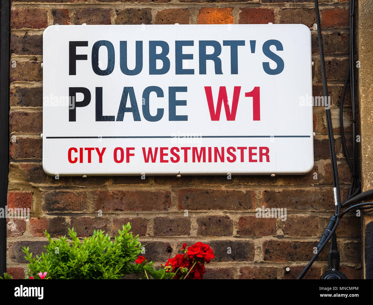 Soho Street serie di segni - Foubert's Place - Londra quartiere Soho di segnaletica stradale Foto Stock