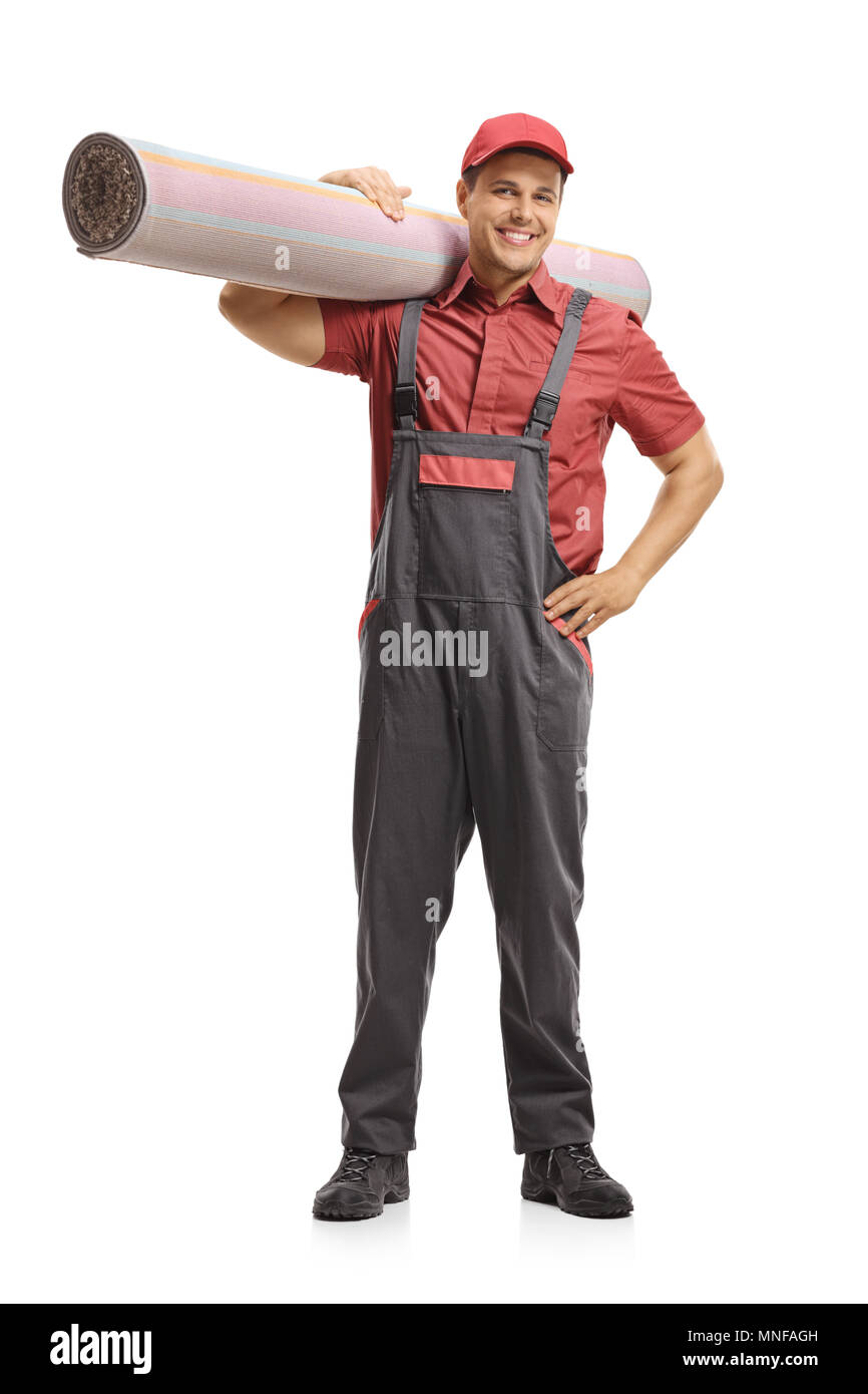 A piena lunghezza Ritratto di un mover tenendo un tappeto isolato su sfondo bianco Foto Stock