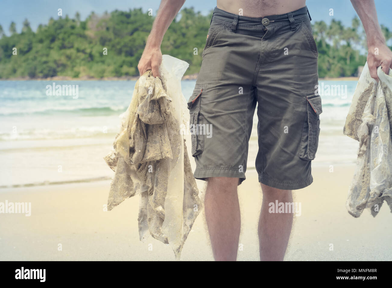 Volontari spiagge pulite Foto Stock