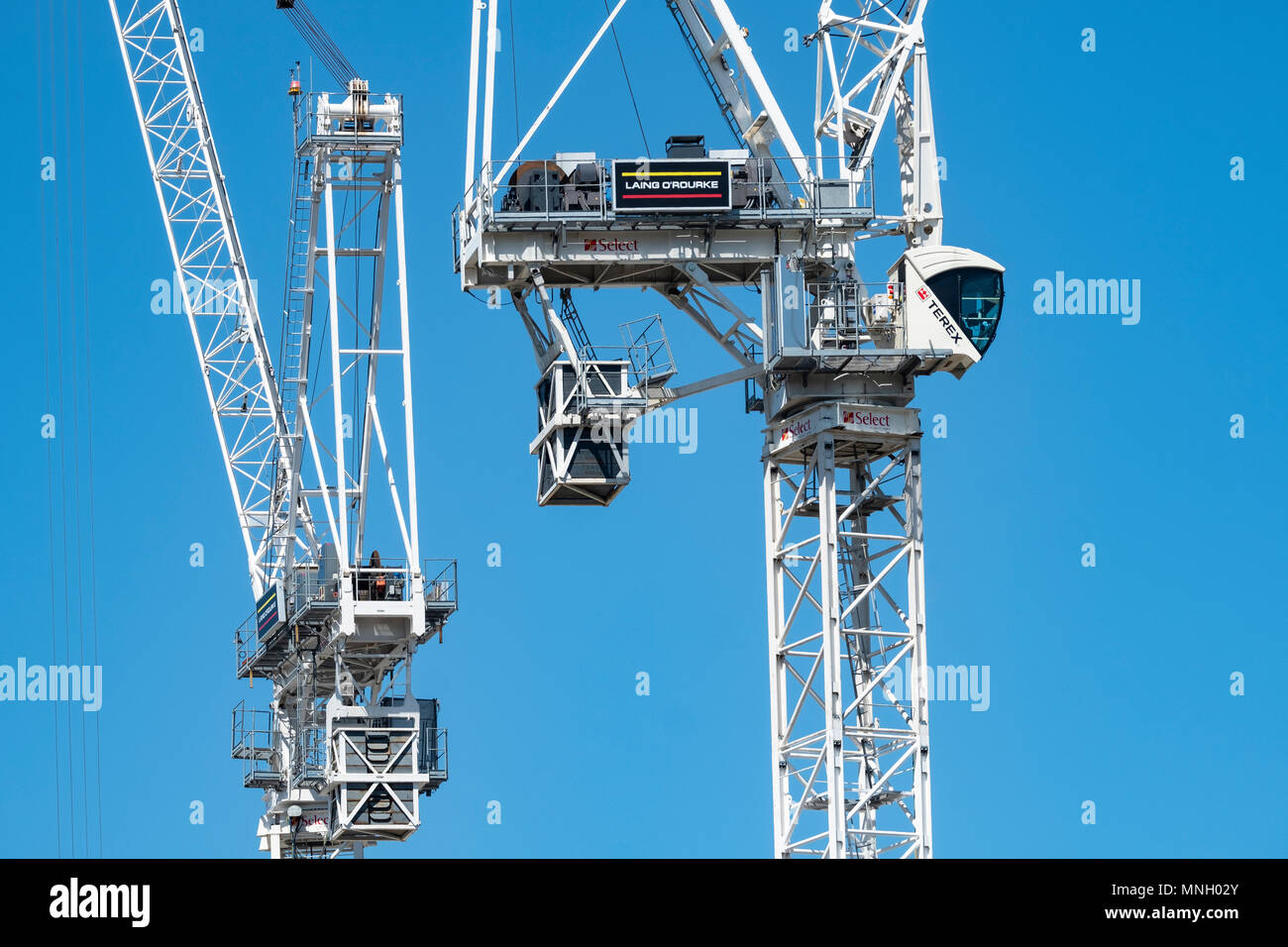 Costruzione delle gru a torre al cantiere della nuova St James lo sviluppo del centro di Edimburgo, in Scozia, Regno Unito,UK Foto Stock