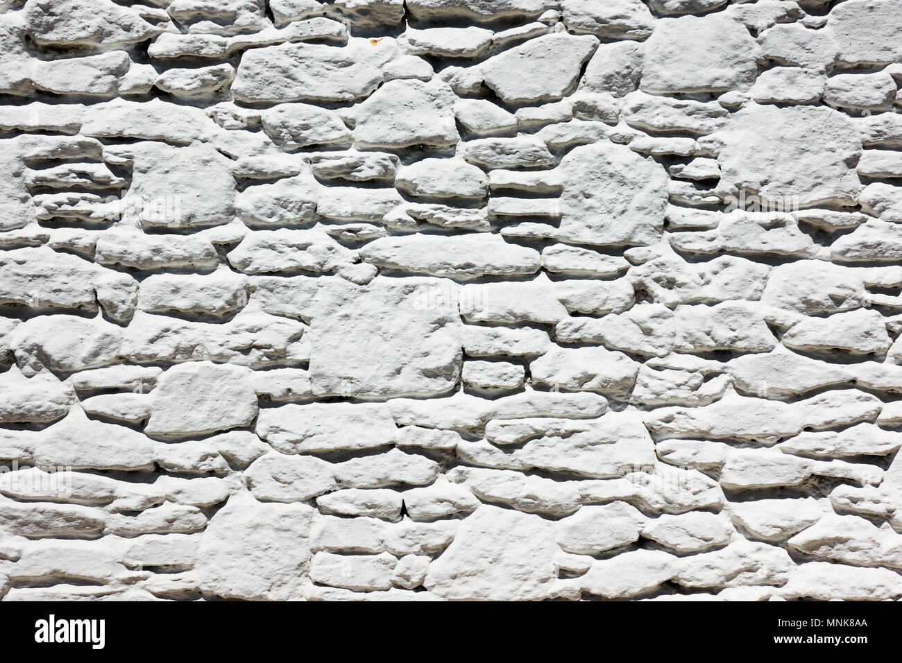 Muro Bianco - muratura di pietre bianche, può essere utilizzato come sfondo Foto Stock