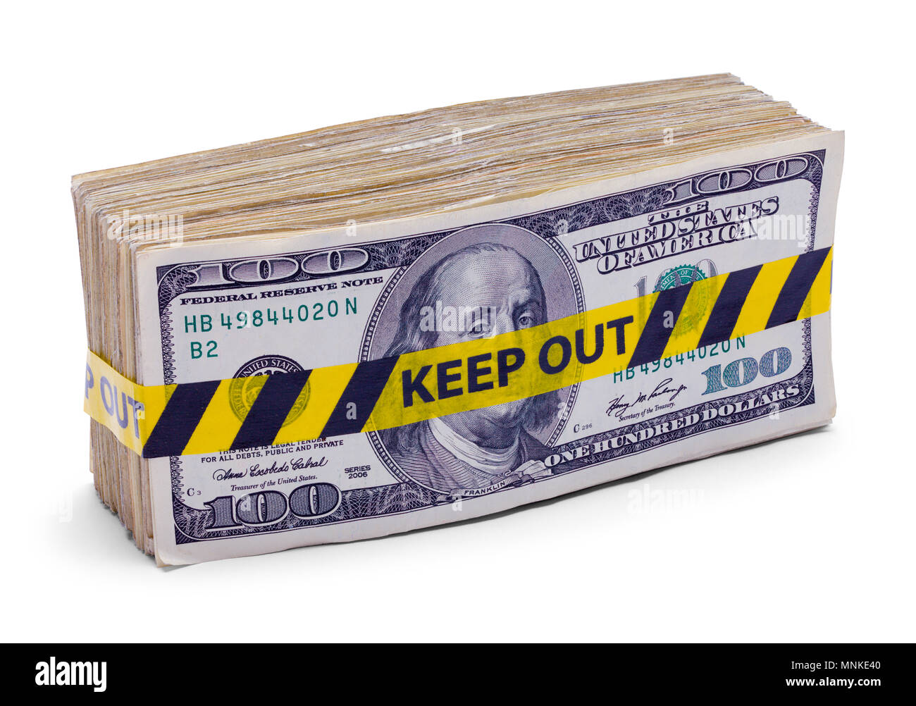 Borra di centinaia di fatture del dollaro con tenere fuori il nastro isolato su bianco. Foto Stock