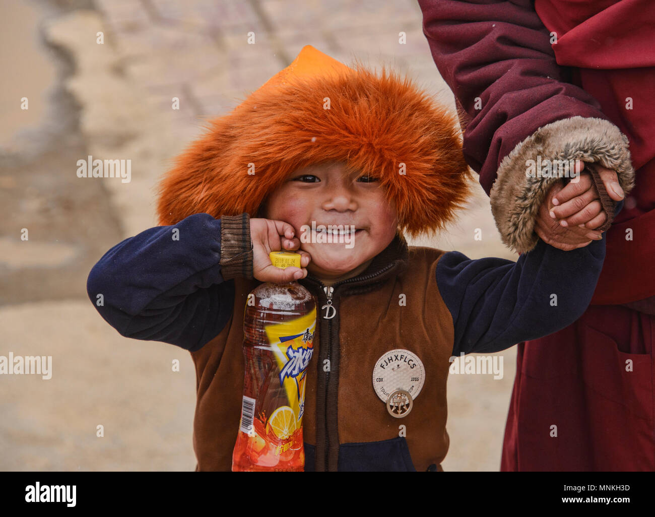 Ragazzo tibetano, Yarchen Gar, Sichuan, in Cina Foto Stock