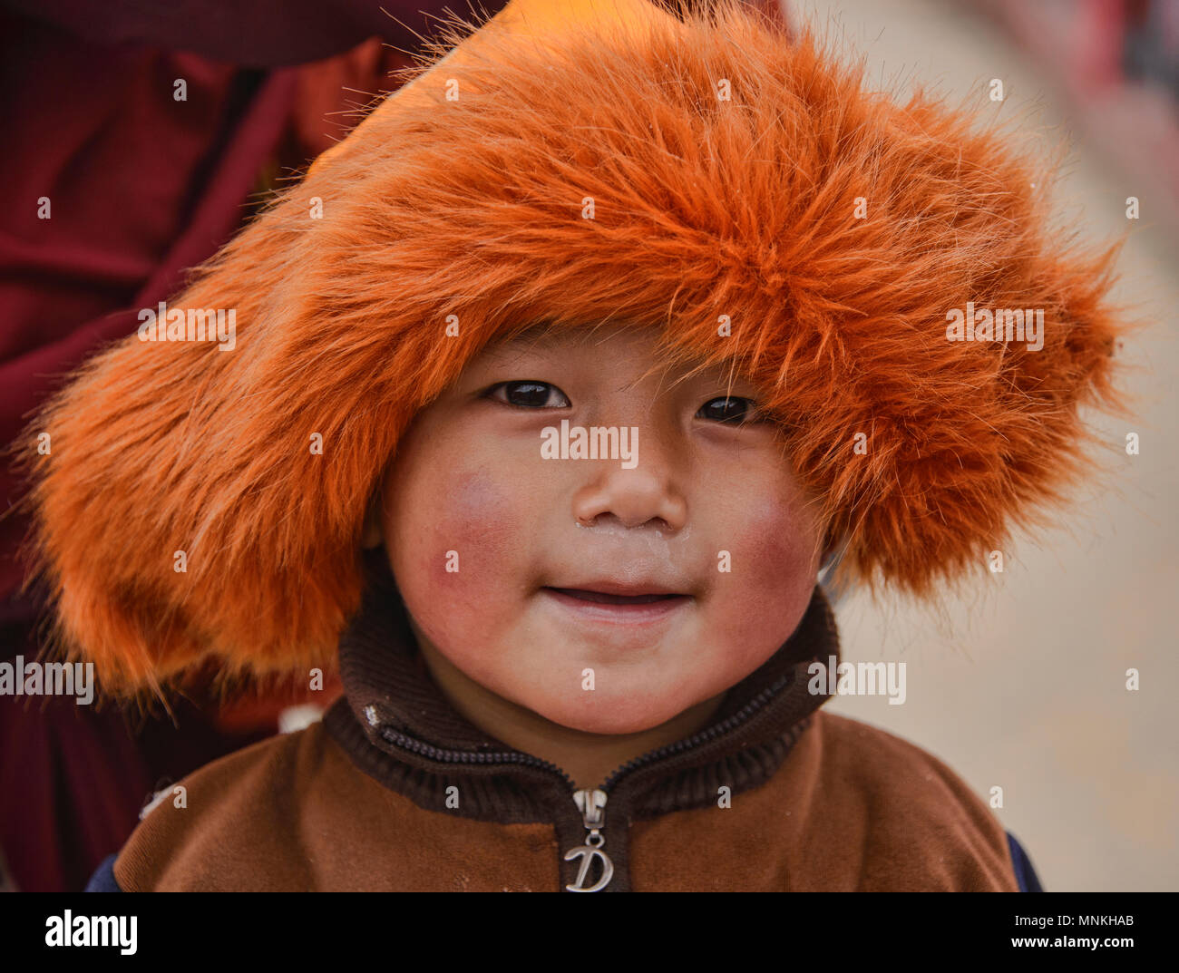 Ragazzo tibetano, Yarchen Gar, Sichuan, in Cina Foto Stock