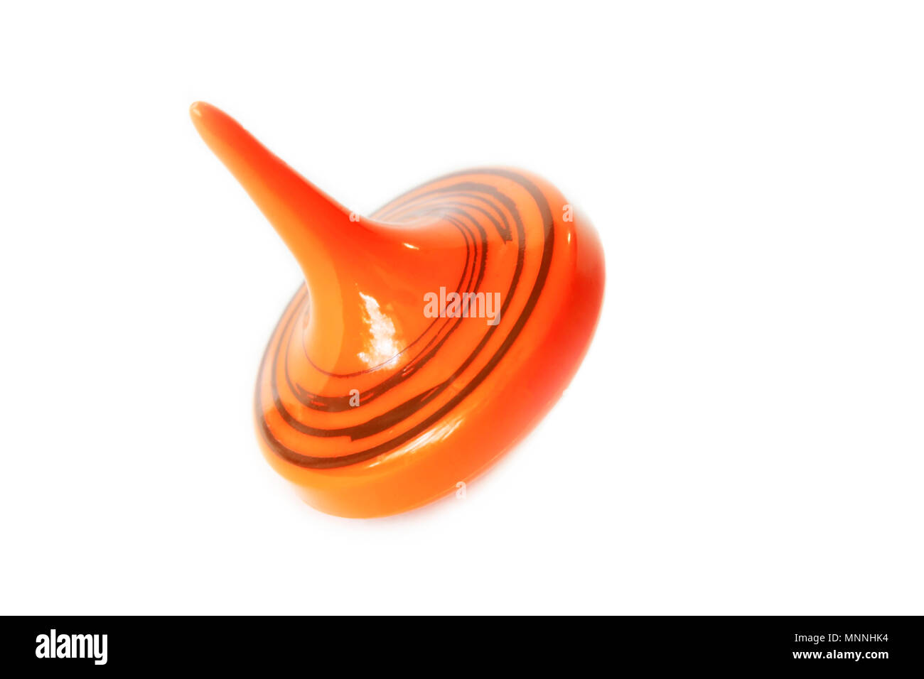 Giocattolo di plastica arancione whirligig isolati su sfondo bianco Foto Stock