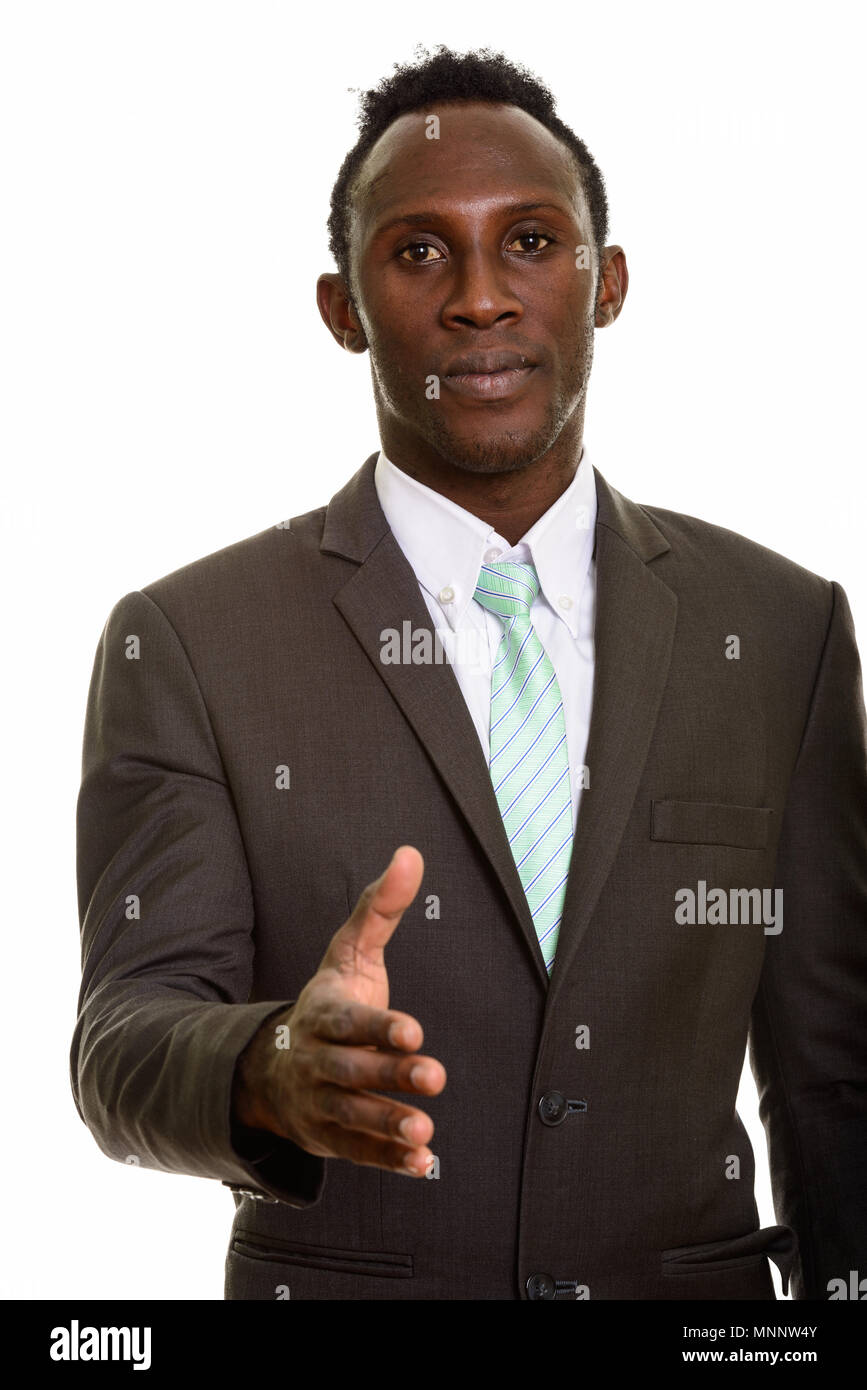 Giovane Africano nero imprenditore dando handshake Foto Stock