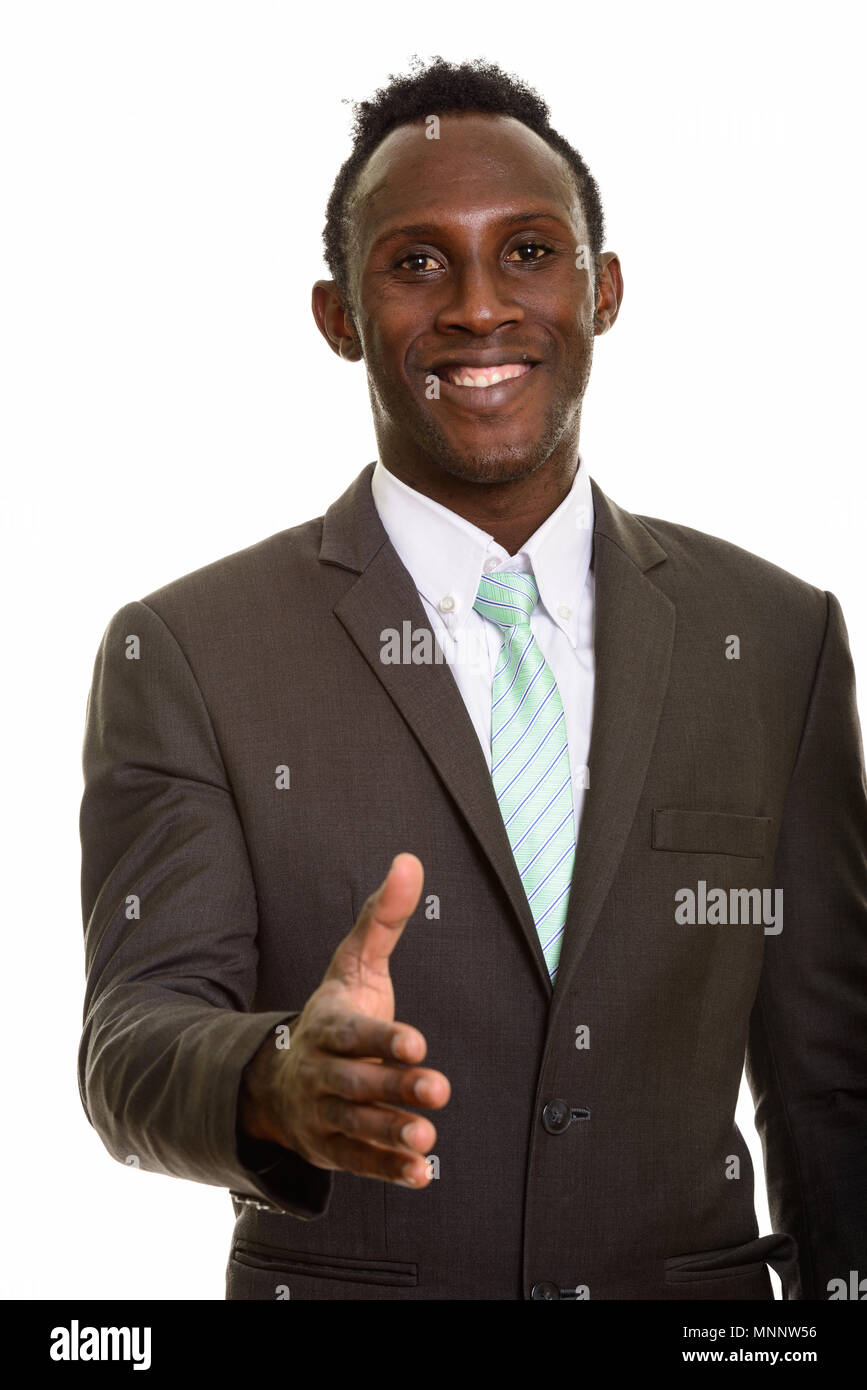Giovani felici Africano nero imprenditore sorridente e dando handsha Foto Stock