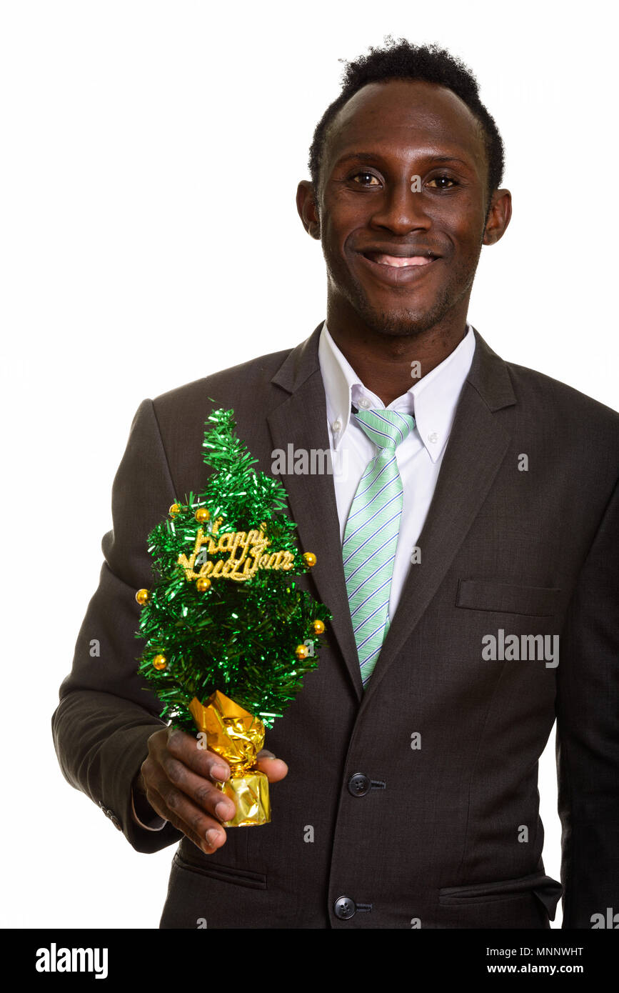 Giovani felici Africano nero imprenditore sorridente tenendo Happ Foto Stock