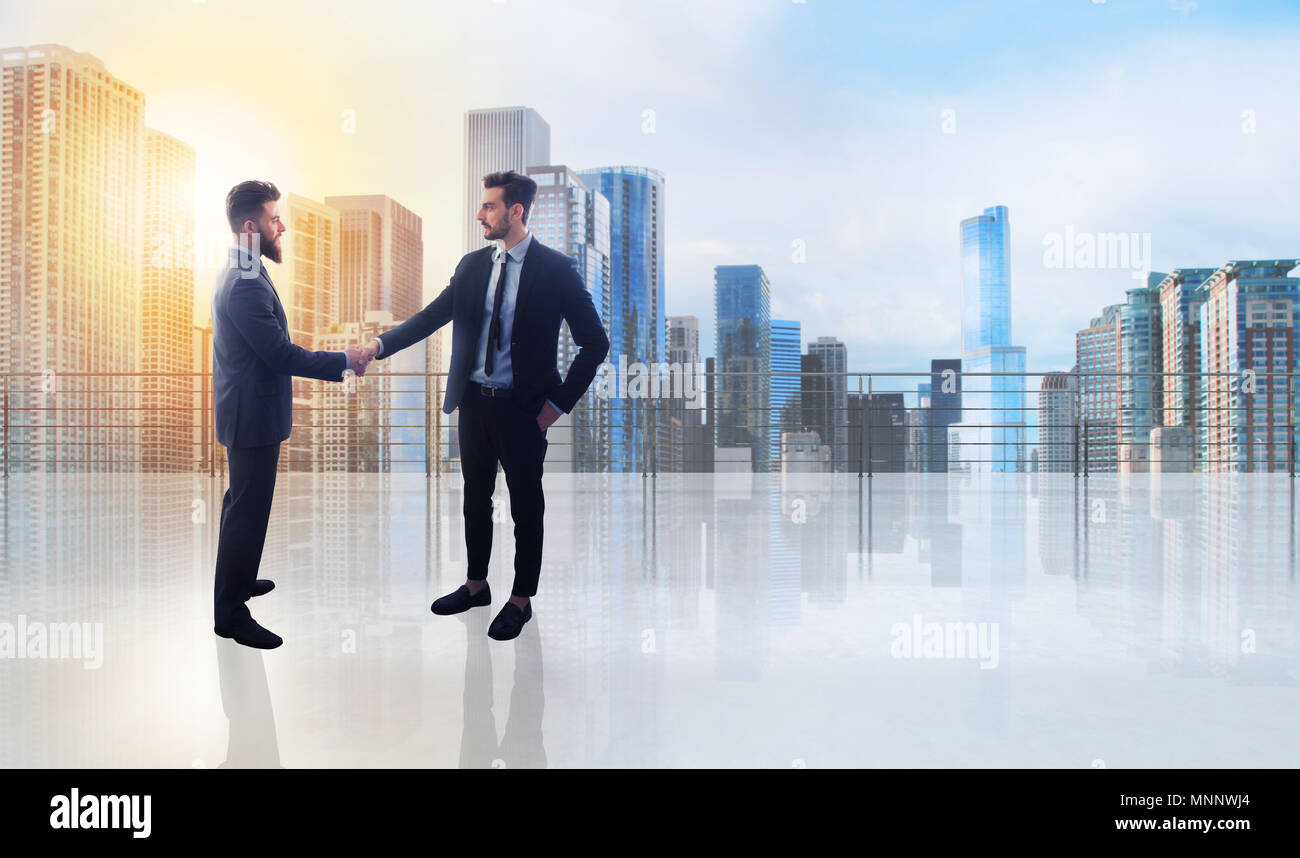 Business handshake. Concetto di partnership e il lavoro di squadra Foto Stock