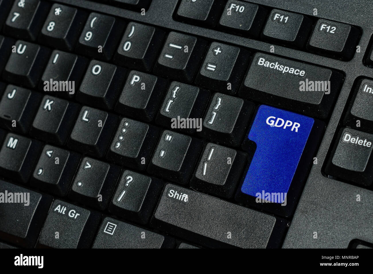Il blu dei tasti della tastiera con testo PILR come simbolo per la privacy e Dati Generali Regolamento di protezione su un computer portatile Foto Stock