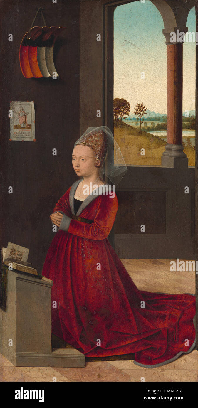 Pittura; olio su pannello; complessivo: 41,8 x 21,6 cm (16 7/16 x 8 1/2 in.) incorniciato: 54,3 x 35,5 x 9,2 cm (21 3/8 x 14 x 3 5/8 in.); Deutsch: Kniende Stifterin 1450-1460. 979 Petrus Christus 004 Foto Stock