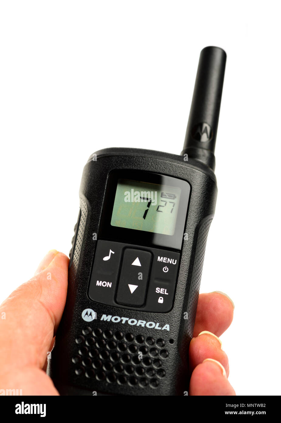 Mano isolati tenendo un walkie-talkie Foto Stock