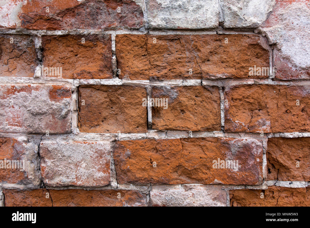 Chiudere il vecchio muro di mattoni. Grunge background distrutti. Foto Stock