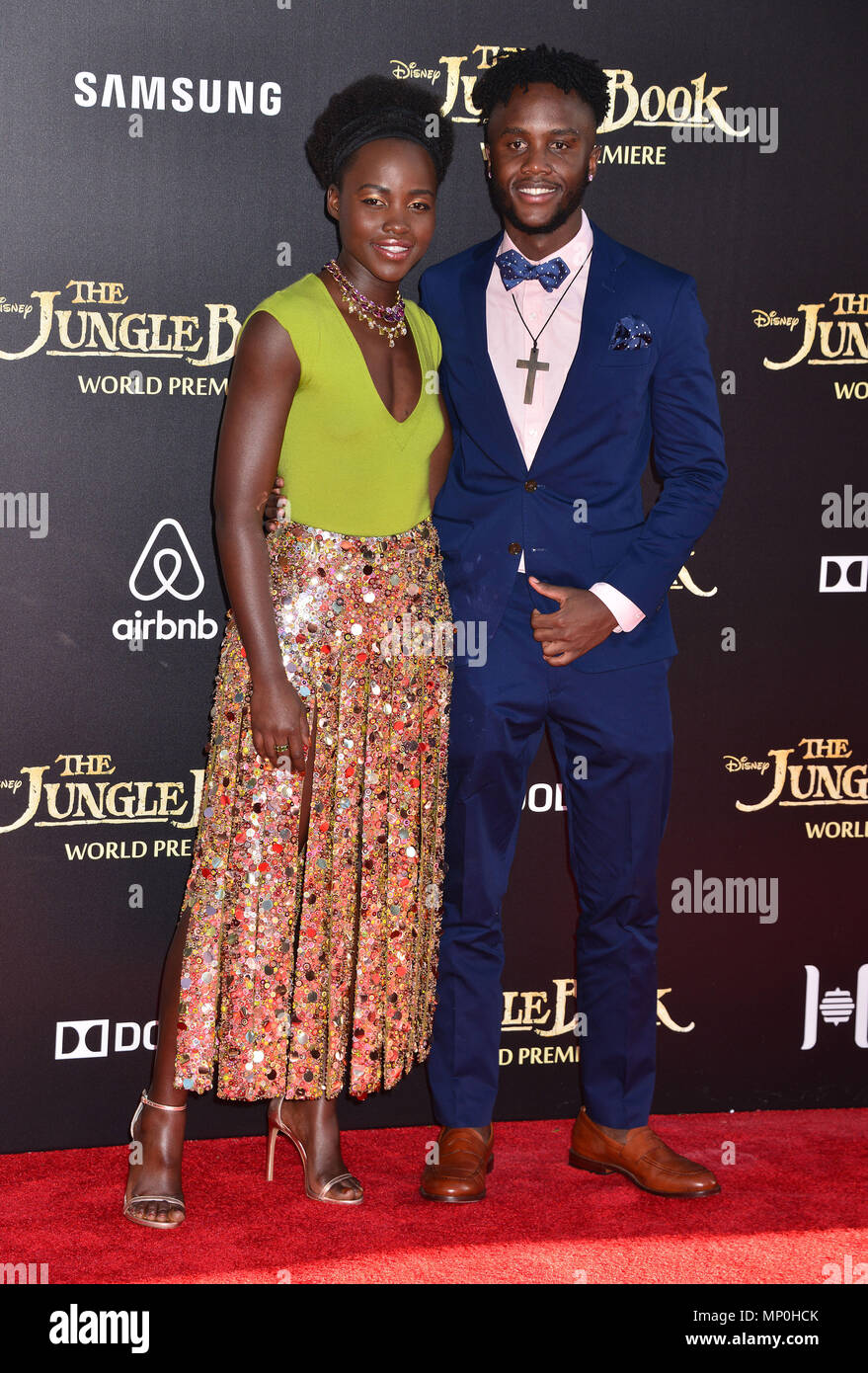 Lupita Nyong'o, fratello Pete al Libro della Giungla Premiere al El Capitan Theatre di Los Angeles. 4 Aprile 2016.Lupita Nyong'o, fratello Pete ------------- Red Carpet Event, verticale, STATI UNITI D'AMERICA, industria cinematografica, celebrità, fotografia, Bestof, arte cultura e intrattenimento, Topix celebrità moda / Verticale, meglio di, evento nella vita di Hollywood - California, moquette rossa e dietro le quinte, USA, industria cinematografica, celebrità, movie celebrità, personaggi televisivi, musica celebrità, fotografia, Bestof, arte cultura e intrattenimento, Topix, verticale, famiglia da dall'anno , 2016, inchiesta tsuni@Gamma-US Foto Stock