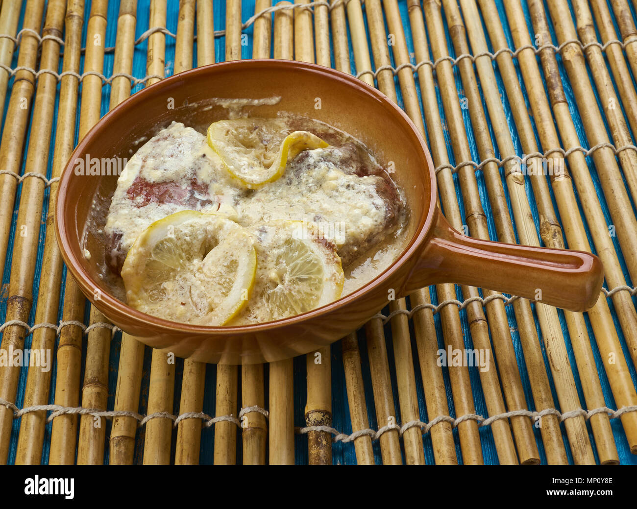 Scallopini vitello Piccata - scaloppine, piatto italiano Foto Stock