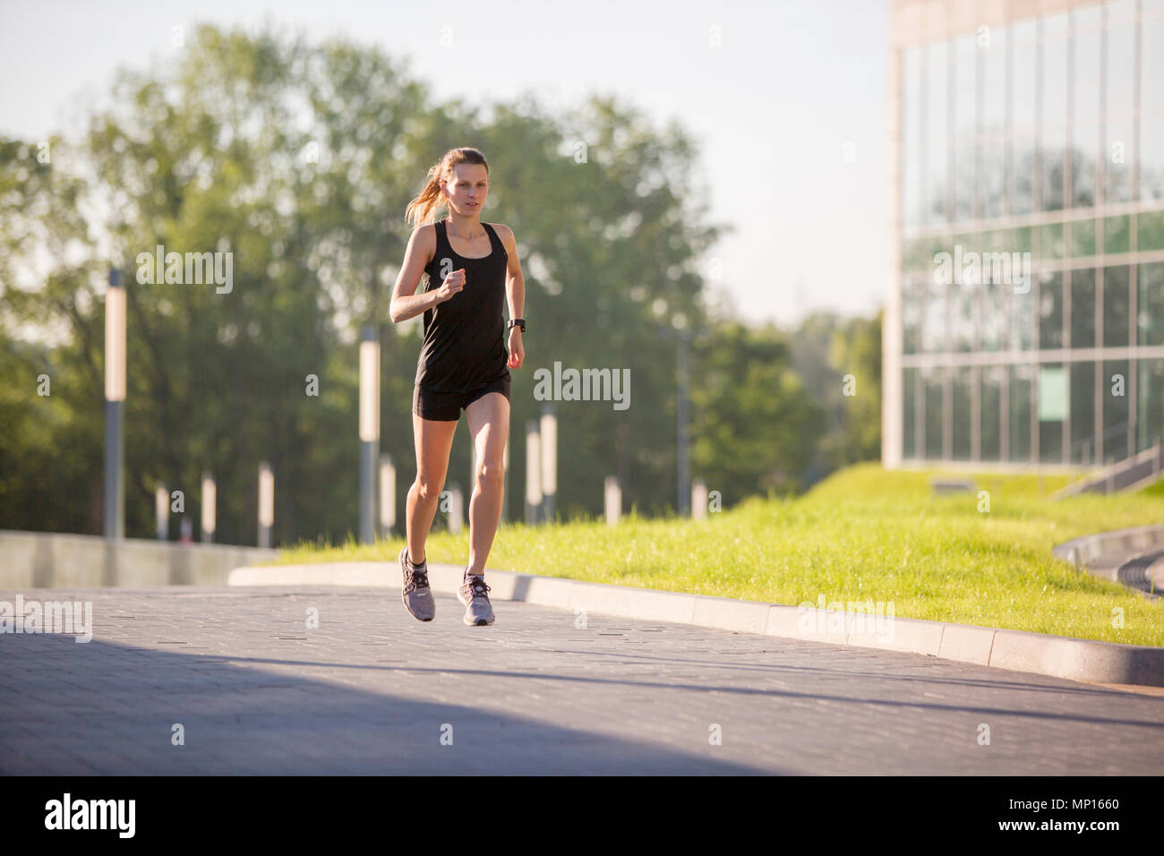 Donna urban Runner Foto Stock