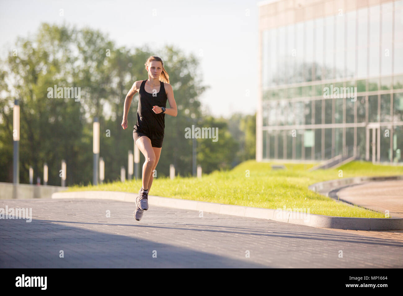 Donna urban Runner Foto Stock