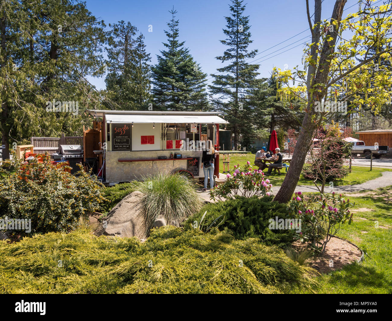 'Sizzle' cibo all'aperto cucina, Hornby Isola, BC, Canada. Foto Stock