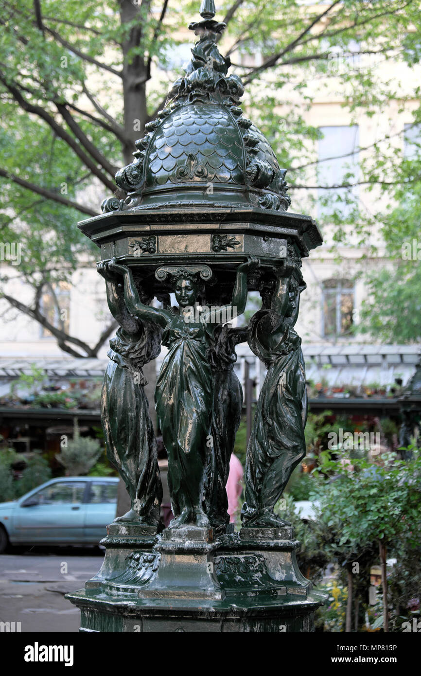 Sir Richard Wallace filantropista fontana pubblica di acqua potabile al mercato dei fiori su Île de la Cité a Parigi, Francia KATHY DEWITT Foto Stock